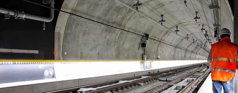 Man in Hi-Vis jacket in tunnel.